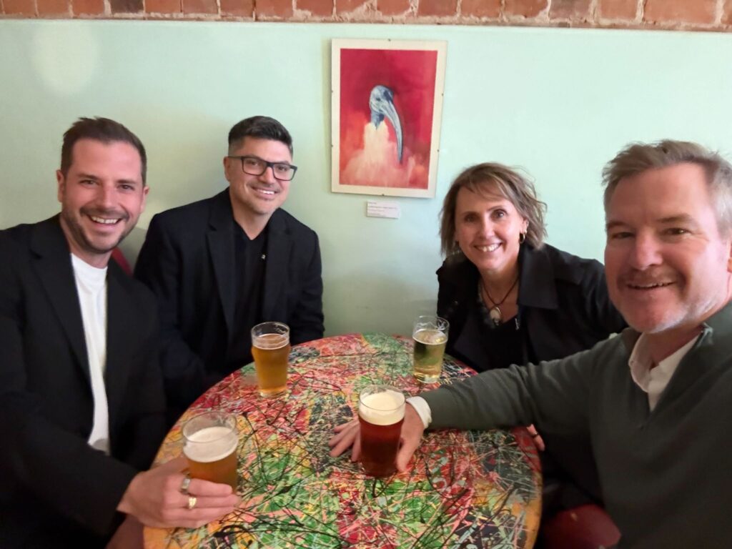 REACH Canada representatives and Repliers co-founder, Pat Arlia, and CEO, Rhett Damon, post for photo at restaurant during TRREB Realtor Quest 2026 Conference